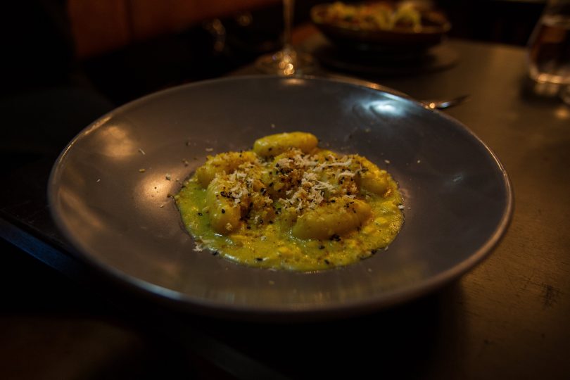 Golden yellow gnocchi with corn kernels and miso. Photo: Robert Pepper