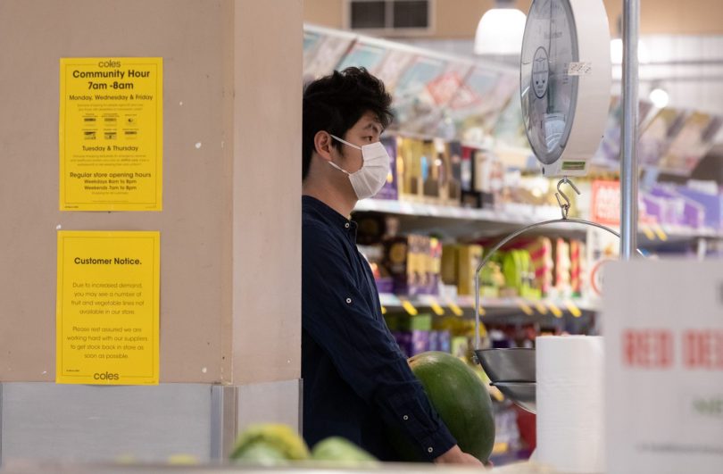 Supermarket shoppers with mask