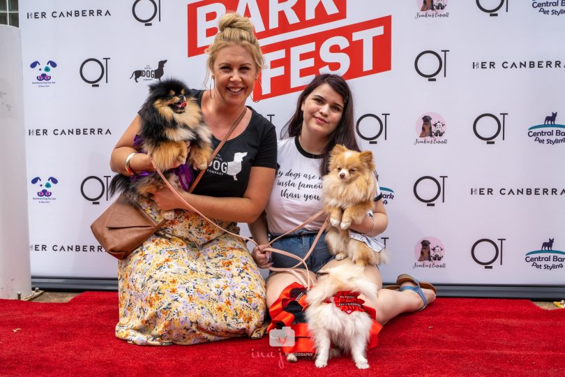 Tatum Brown with Talia Wilson and her three dogs at BarkFest