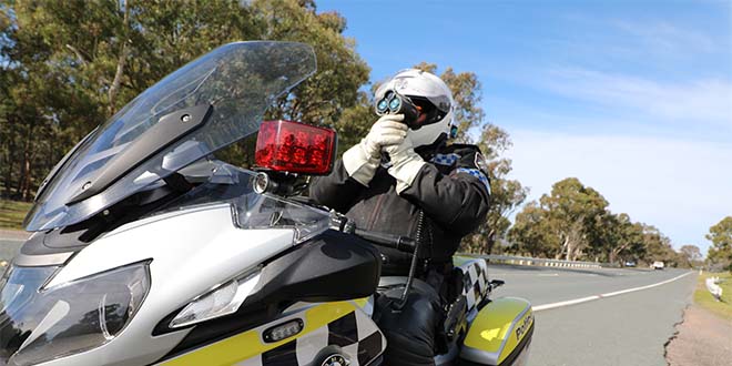 ACT Policing speeding motorcycle cop