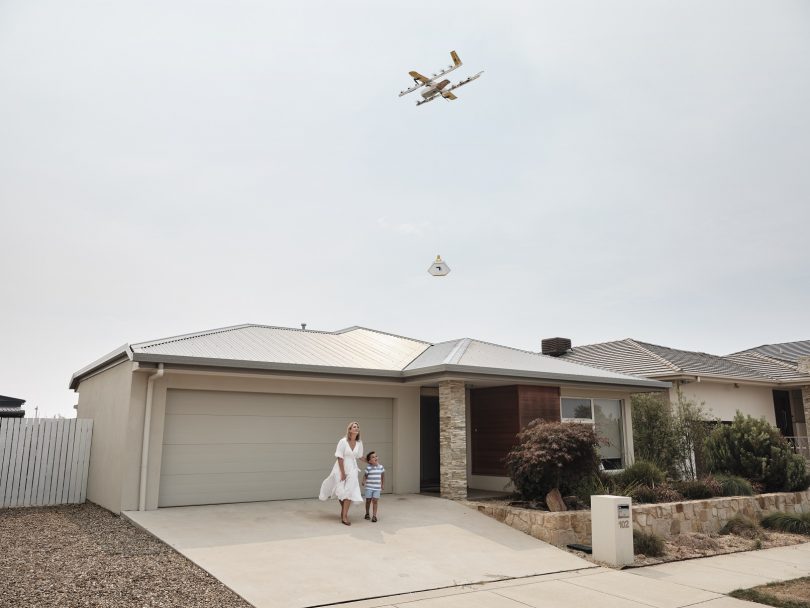 A Wing drone delivers to a house