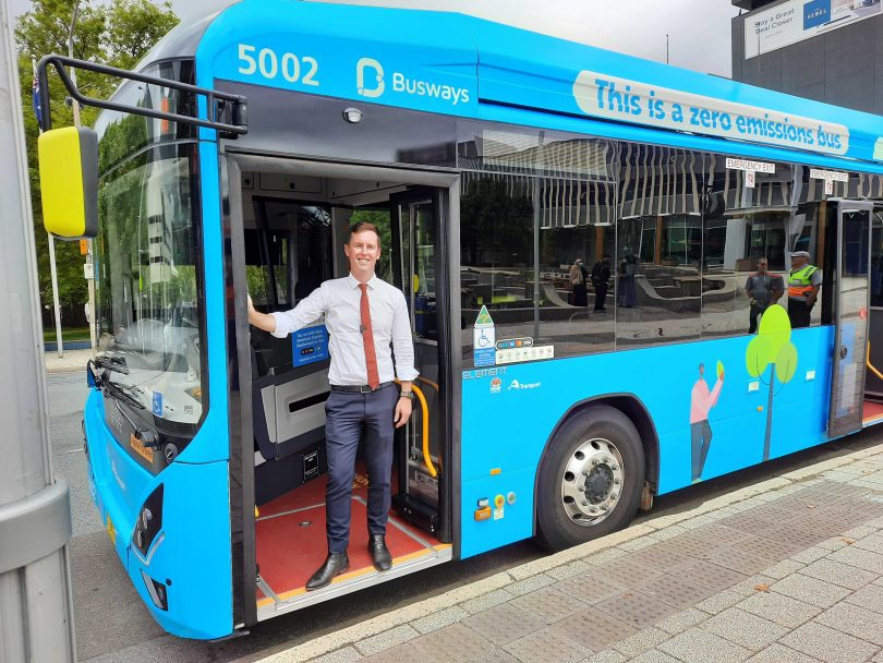 Transport Minister Chris Steel with a Transport NSW electric bus