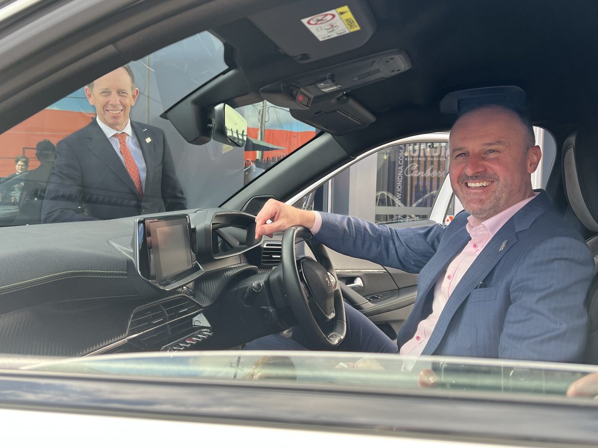 Shane Rattenbury and Andrew Barr in an electric car