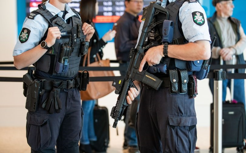 AFP officers with guns in airport