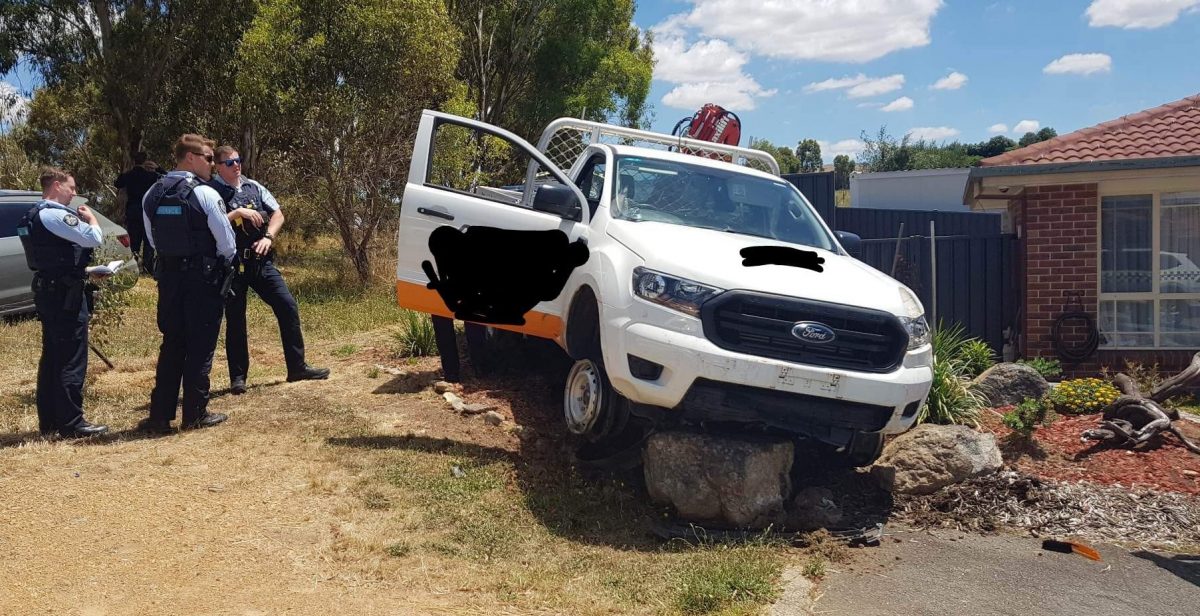 Ute crashed on rocks in a front garden