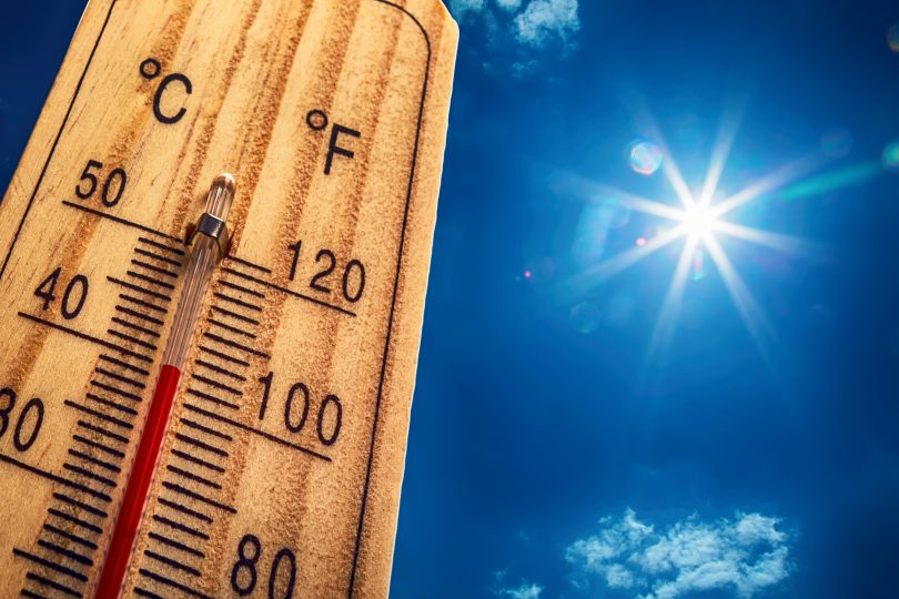 thermometer with a sun