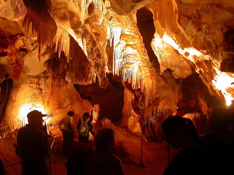 Visitors exploring Careys Cave.