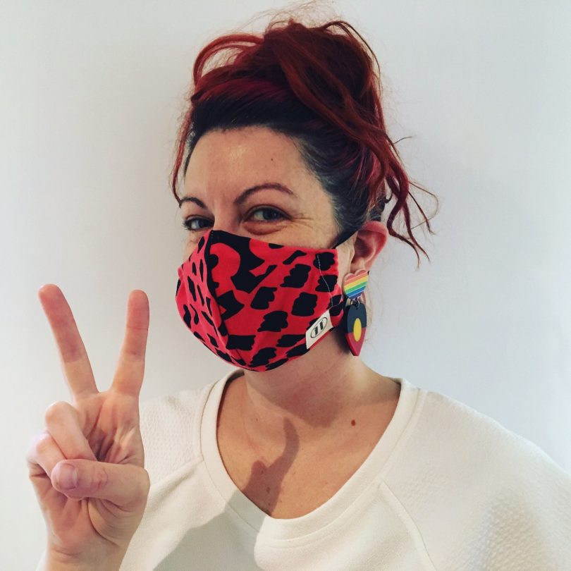 Bronwyn Napiorkowski, who grew up in Bega and now lives in Melbourne, models one of her handmade facemasks. Photo: Supplied.